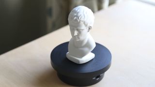 Using a 3D scanner to create a digital scan of a bust of a head, by Paul Hatton