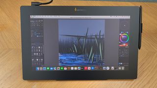 Xencelabs Pen Display 16 review; a pen display on a wooden desk