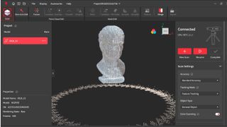 Using a 3D scanner to create a digital scan of a bust of a head, by Paul Hatton