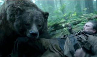 Best CGI creature designs; a bear bites a man