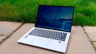 MSI Prestige 14 Evo B13M laptop sitting on stone patio