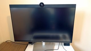 A Dell UltraSharp U3223QZ monitor, one of the best monitors for working from home, sitting on a desk