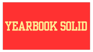 Yellow and orange text on a red background displaying the font Yearbook Solid.