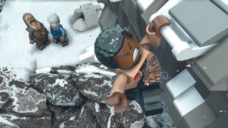 History of Star Wars PlayStation games; a lego man hangs off a rock