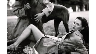 Advert for Burberry showing Kate Moss lying on the ground next to a horse