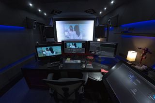 A home studio with many screens