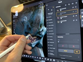 ZBrush for iPad review; a person using a 3D modelling app on an iPad