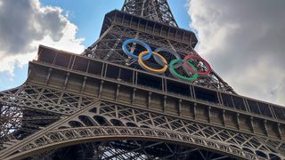 The Eiffel Tower with the Olympic Rings logo for Paris 2024 Olympic Games