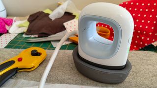 Best Cricut accessories; a small craft iron on a mat