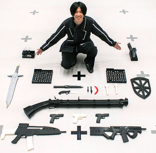 Cygames worker with lots of different weapons on the floor in front of him