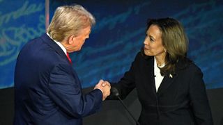 Trump and Kamala shaking hands