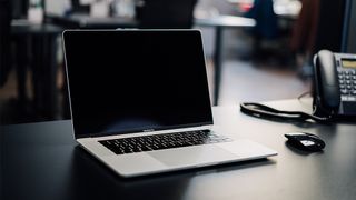 An image of a black screen on MacBook Pro