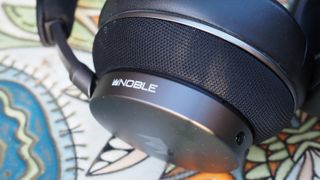 A pair of Noble Fokus Apollo noise-cancelling headphones