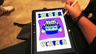 Apple event Battersea, iPad using procreate with a christmas sweater on