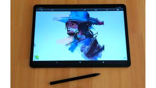 Ugee UT3 review; a drawing display on a wooden table