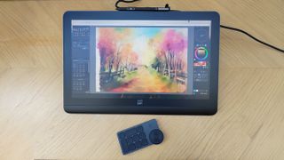 XPPen Artist Pro 19 (Gen 2) review; photos of a drawing tablet being used