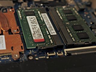 Re-seat RAM in back of laptop