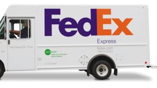 FedEx logo on side of van