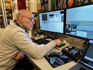 man looking at computer screen