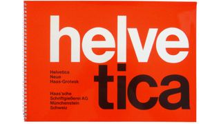 The word 'helvetica' in large caps, split and stacked