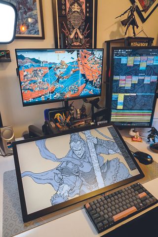 Inside the artist's studio; a Cintiq drawing tablet