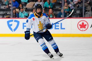 Hockey player wearing the Toronto Sceptres kit